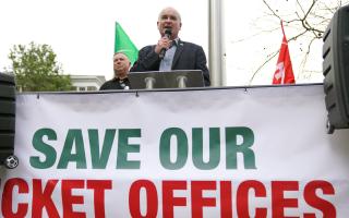 Rail, Maritime and Transport (RMT) union general secretary Mick Lynch speaking at a rally.