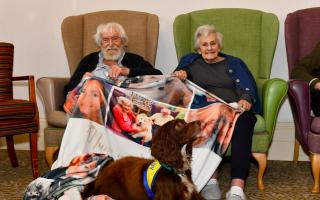 Oriel Care Home residents, Toni and Len Browning, pictured with therapy dog Sprocker Spaniel Lester