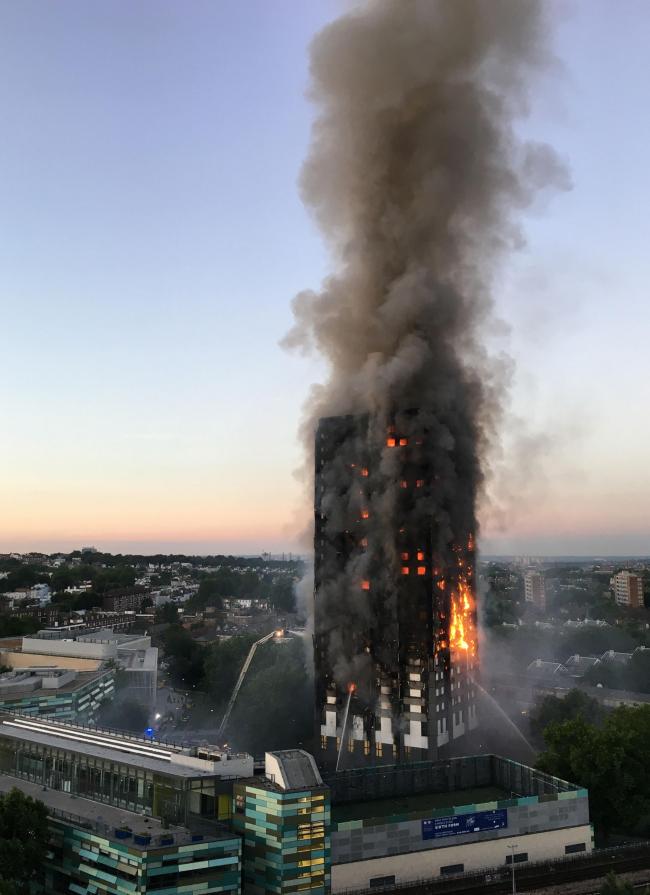 File photo dated 14/06/17 of the fire at Grenfell Tower in west London as police are investigating eight cases of fraud involving people who claimed money following the Grenfell disaster and four possible thefts from flats on the lower levels of the Tower
