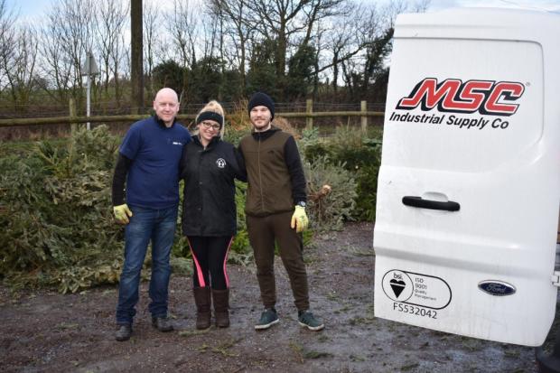 Laura Millard from Mary Stevens Hospice, centre, with volunteers from MSC Industrial Supply – Steve Tallent, left, and Lee Gray, right.